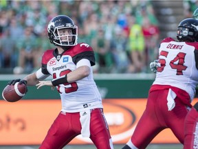 Calgary Stampeders quarterback Bo Levi Mitchell (19) looks to make a pass against the Saskatchewan Roughriders during the first quarter of CFL football action in Regina on Saturday, August 13, 2016.