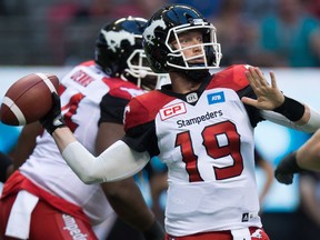 Calgary Stampeders' quarterback Bo Levi Mitchell passes against the B.C. Lions during the first half of a CFL football game in Vancouver, B.C., on Friday August 19, 2016.