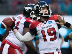 Calgary Stampeders' quarterback Bo Levi Mitchell passes against the B.C. Lions during the first half of a CFL football game in Vancouver, B.C., on Friday August 19, 2016.