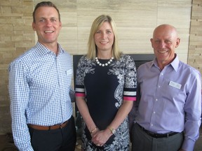 Cal 0827 Priddis 5  Pictured with 325,000 reasons to smile at the 2016 Priddis Greens Charity Classic Gala Evening held Aug 9 at Priddis Greens are, from left, tournament co-chair Ross Babcock and is wife Lisanne with tournament co-chair and Prostate Cancer Centre board member Bas Wheeler. The gala and tournament raised $325,000 for the Centre