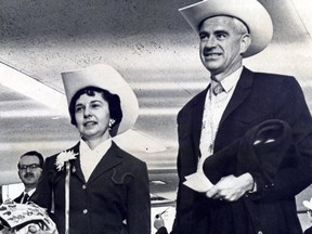 Calgary Mayor Jack Leslie (right) and his wife Jean arrive at the Calgary airport in this November 1969 file photo on their way to the Grey Cup in Toronto.