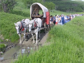 A file photo of a reenactment of the Mormon Trail through the Porcupine Hills of Southern Alberta. PUBLISHED JUNE 30, 2002