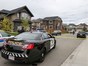 Calgary City Police at the scene of a death on Cranford Green S.E. in Calgary, AB., on Saturday August 27, 2016.