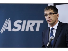 Eric Tolppanen, Assistant Deputy Minister, Alberta Crown Prosecution Service, speaks during an ASIRT announcement  there will be no charges in Anthony Heffernan's death. Heffernan was shot and killed by police in a northeast Calgary hotel room while he high on drugs. The announcement was held ASIRT's Calgary offices on Monday August 22, 2016. Gavin Young/Postmedia
