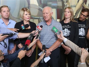 Family members of Anthony Heffernan speak to the media following an ASIRT announcement that there will be no charges in his death. From left are; brother Grant, mother Irene, dad Pat, sister Natalie and brother-in-law Joseph. Anthony was shot and killed by police in a northeast Calgary hotel room while he was a high drugs.  Gavin Young/Postmedia