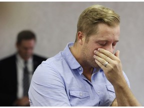 Grant Heffernan shows emotion during an ASIRT announcement there will be no charges in his brother Anthony Heffernan's death. Anthony was shot and killed by police in a northeast Calgary hotel room while he was high on drugs.  Gavin Young/Postmedia