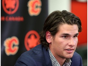 Sean Monahan speaks to members of the media at the Scotiabank Saddledome in Calgary, Alta. on Friday August 19, 2016, following his Calgary Flames seven year contract extension.