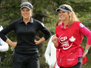 Canadian Brooke Henderson, left and her sister Brittany during the Canadian Pacific Women's Open at Priddis Greens Golf and Country Club west of Calgary, Alta.,  August 25, 2016.