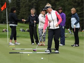 Brooke Henderson during a clinic put on by RBC at Priddis Greens Golf and Country Club west of Calgary, Alta., on Tuesday August 23, 2016. Henderson is in town to compete in the Canadian Pacific Women's Open.  Leah Hennel/Postmedia