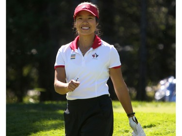 Calgarian Jaclyn Lee is all smiles after her shot from the first tee during round 2 of the Canadian Pacific Women's Open at Priddis Greens Golf and Country Club west of Calgary, Alta.,  August 26, 2016.