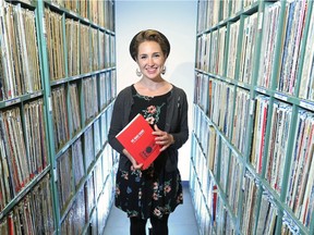 Kendra Scanlon with CJSW helped put together a book about the 30-year history of the University of Calgary radio station. She was photographed in the station's music archives on Tuesday August 23, 2016.