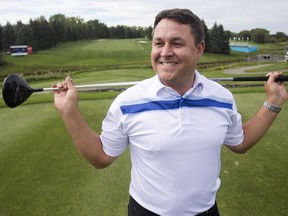 Matt Freeman, head pro at Canyon Meadows Golf Club, stretches on the first tee Monday August 29, 2016 as the course welcomes the Shaw Charity Classic. (Ted Rhodes/Postmedia)