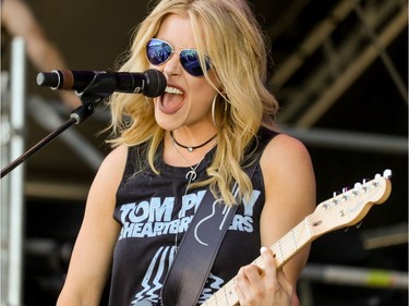 Calgary's Lindsay Ell performs at day 2 of Country Thunder at Prairie Winds Park in Calgary, Ab., on Saturday August 20, 2016. Mike Drew/Postmedia