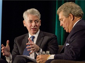 Bill Ackman, founder and chief executive officer of Pershing Square Capital Management LP, left, speaks with Canadian Pacific Railway CEO Hunter Harrison in Toronto in 2012.