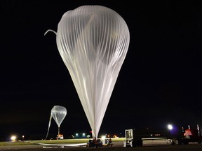 A group of Canadian Space Agency engineers is working with students from Sir Wilfrid Laurier School in Calgary as the kids to prepare their stratospheric balloon experiment. (Photo: Canadian Space Agency)