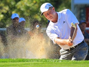 Rod Spittle chips out of a bunker on the 17th hole during round 2 of the Shaw Charity Classic at Canyon Meadows Golf and Country Club on August 31, 2013.