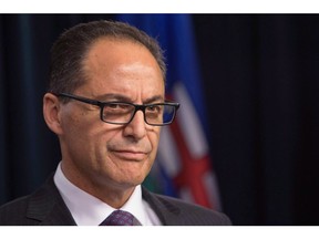 Alberta Finance Minister Joe Ceci releases the 2015-16 year-end financial results in Edmonton on Wednesday, June 29, 2016. The devastating Fort McMurray wildfire is expected to torch Alberta's bottom line by about $500 million this year.Finance Minister Ceci says he had to revise the projected deficit upward in his first-quarter fiscal update to almost $11 billion from $10.4 billion.