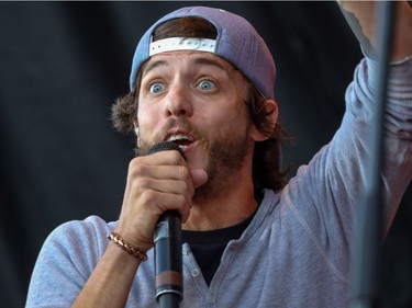 Chris Janson performs at day 2 of Country Thunder at Prairie Winds Park in Calgary, Ab., on Saturday August 20, 2016. Mike Drew/Postmedia