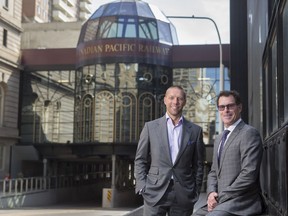 John Moss, vice-president leasing and sales, CBRE Limited, left, and Bryan Walsh, senior vice-president, outside the Canadian Pacific Railway building in downtown Calgary.