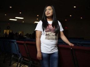 Reylene Punzalan, a migrant worker from the Philippines who is working in seafood processing in New Brunswick, poses for a photo at the Shediac Bay Community Church on Sunday August 28, 2016. Thanks to a rule that limited many temporary foreign workers to four years in Canada starting in April 2015, Canada's undocumented population may have grown by more than 100,000 people.