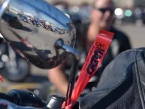 A MADD ribbon is tied to a bike for the Sober Riders Motor Association (SRMA) and MADD Annual Poker Run in Calgary, Alta., on Sunday, Aug. 14, 2016. Elizabeth Cameron/Postmedia