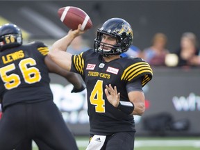 Hamilton Tiger-Cats quarterback Zach Collaros (4) passes during the first half of CFL football action in Hamilton on Saturday, August 20, 2016.