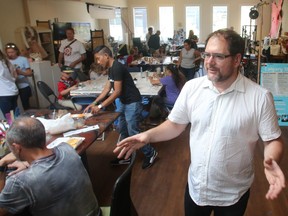 Shannon Hoover shows off the shared workshop he runs for small businesses and entrepreneurs Thursday August 4, 2016 in Calgary. (Ted Rhodes/Postmedia)