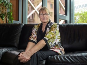 Joan van Niekerk poses for a portrait after speaking at the International Congress for the Prevention of Child Abuse and Neglect (ISPCAN), held at the Telus Convention Centre in Calgary, Ab., on Wednesday, Aug. 31, 2016. Van Niekerk, from South Africa, is a social worker with a masters of medical science in medical and psychiatric social work. Elizabeth Cameron/Postmedia