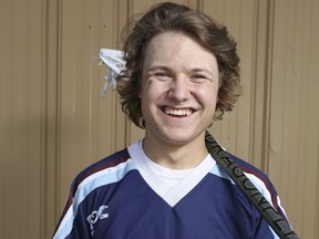 Myles Moffat poses in his Calgary Mountaineers (Mounties) uniform outside the Plainsmen Arena on Tuesday, Aug. 9, 2016 in Airdrie, Alta. The Mounties won the Rocky Mountain Lacrosse League junior A title over the Okotoks Raiders four games to one in a series that ended Aug. 7. They advance to the Minto Cup national tournament in Langley, B.C. Aug. 20-29. (Britton Ledingham)