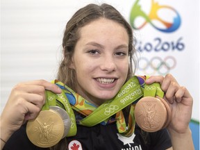 Penny Oleksiak may benefit from long legs and big hands, but she is a champion because she has desire, writes Andrew Cohen.