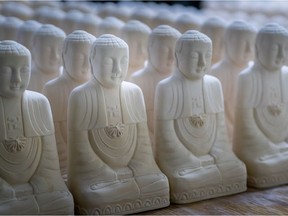 Buddha Images from the Avatasmsaka Monastery. 
Photo by Victor Wong.