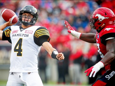 Hamilton Tiger-Cats quarterback Zach Collaros throws a pass during a game against the Calgary Stampeders in Calgary, Alta., on Sunday, August 28, 2016. AL CHAREST/POSTMEDIA