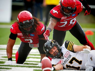 Hamilton Tiger-Cats Luke Tasker can't haul in this pass against the Calgary Stampeders in the end zone during CFL football in Calgary, Alta., on Sunday, August 28, 2016. AL CHAREST/POSTMEDIA