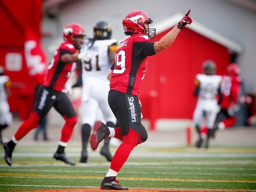 Calgary Stampeders Bo Levi Mitchell celebrates after trowing a touchdown to DaVaris Daniels during CFL football in Calgary, Alta., on Sunday, August 28, 2016. AL CHAREST/POSTMEDIA