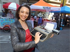 Poet laureate and Mount Royal University instructor Micheline Maylor poses on Stephen Avenue in Calgary, Alta on Tuesday August 9, 2016 as she participates in "Pop-Up Poetry."