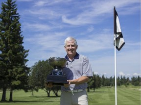 Calgary's David Schultz shows off his hardware after a victory at the 2016 Guardian Capital Alberta Senior Men's Championship at Stony Plain.