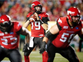 Calgary Stampeders quarterback Bo Levi Mitchell looks to throw the ball during a game against the Saskatchewan Roughriders in CFL football in Calgary, Alta., on Thursday, August 4, 2016. AL CHAREST/POSTMEDIA