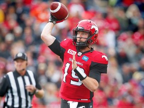 Calgary Stampeders quarterback Bo Levi Mitchell looks to throw the ball during a game against the Hamilton Tiger-Cats in CFL football in Calgary, Alta., on Sunday, August 28, 2016. AL CHAREST/POSTMEDIA