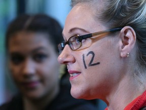Rachelle Christopher (R) speaks and is joined by Dezree Christopher (L) outside of the Calgary Courts Centre in Calgary, Alta on Wednesday August 3, 2016. A small group of Taradale residents had the number 12 marked on their faces to protest the sentence handed down to the Manyshot brothers in a rape case. A spokesperson for the group feel a reduced sentence would be a " glaring failure of the justice system." Jim Wells//Postmedia