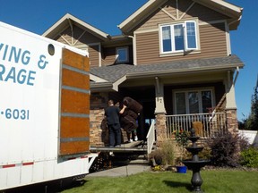 RCMP seize property from a home at 87 Towers Close in Red Deer on August 24, 2016, as part of an ongoing investigation.