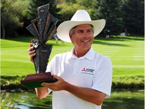 Fred Couples holds the trophy after winning the Shaw Charity Classic at the Canyon Meadows Golf & Country Club on August 31, 2014 in Calgary.