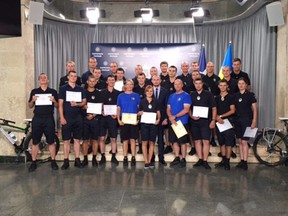 Supplied images show Calgary Police Sgt Katrina O'Reilly (C) who is in the Calgary Police Service Mountain Bike Unit, as she instructs 50 police officers, in Kyiv, Ukraine from July 8-25, 2016.