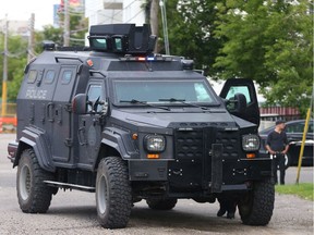 The Calgary Police armoured vehicle is shown during an operation 11 Ave. and 20 St. S.W. as they set to arrest a man in an apartment in Calgary, on Wednesday July 27, 2016.