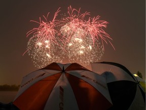 The rainy finale of GlobalFest 2016 at Elliston Park in Calgary, Ab., on Saturday, Aug. 27, 2016. Elizabeth Cameron/Postmedia