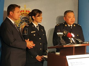 Representatives from the Canadian Border Services Agency, the RCMP and Calgary police at a news conference announcing the seizure of 1 kg of the deadly drug carfentanil