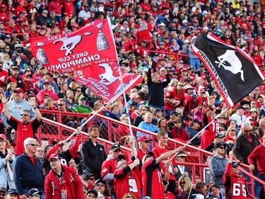 Calgary Stampeders fans cheer on their team during the CFL Labour Day Classic in Calgary on Monday September 5, 2016.