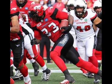 Calgary Stampeders running back Jerome Messam runs the ball in the first half of CFL football action between the Stampeders and Ottawa Redblacks at McMahon Stadium in Calgary on Saturday September 17, 2016.