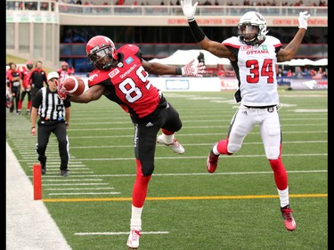 Calgary Stampeders receiver DeVaris Daniels makes a one-handed catch for a spectacular touchdown in the second half of  CFL football action between the Stampeders and Ottawa Redblacks at McMahon Stadium in Calgary on Saturday September 17, 2016.