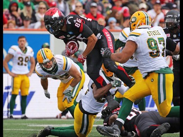 Calgary Stampeders receiver Anthony Parker is tackled after catching a pass during the second half of the CFL Labour Day Classic in Calgary on Monday September 5, 2016.