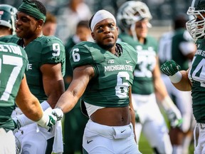 Game photo of Mylan Hicks as a defensive back with the Michigan State Spartans football team. (Courtesy Michigan State University)